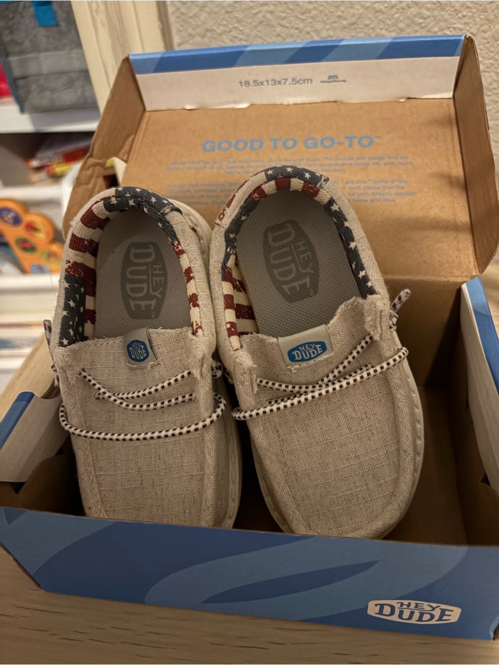 Hey Dude Beige Slip-On Shoes with Flag-Patterned Lining